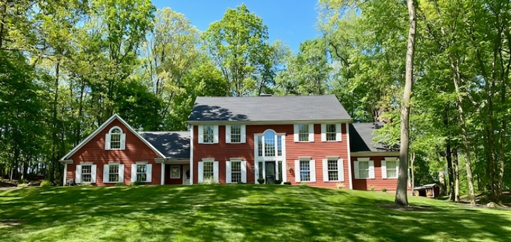 Suburban residential homes surrounded by green trees in Pittsburgh PA