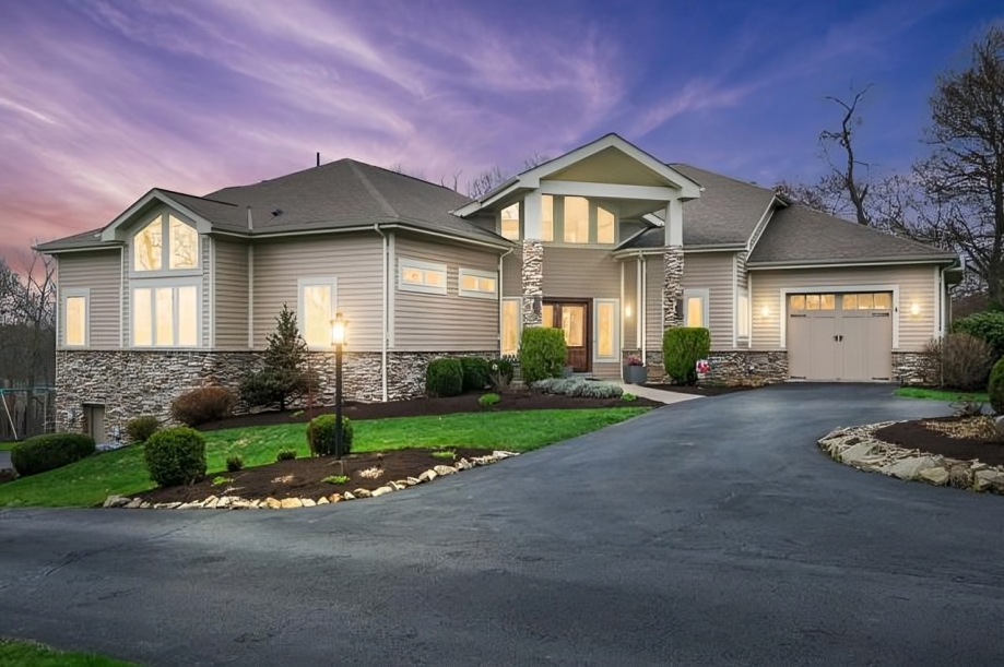 Modern craftsman style home with exterior lighting in Pittsburgh PA